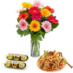 Mix Gerberas in vase with biryani and chocolates