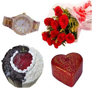 (29) Cake W/ red roses, ladies watch & candles